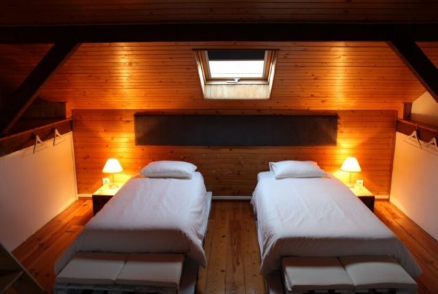 Attic room beds surf house